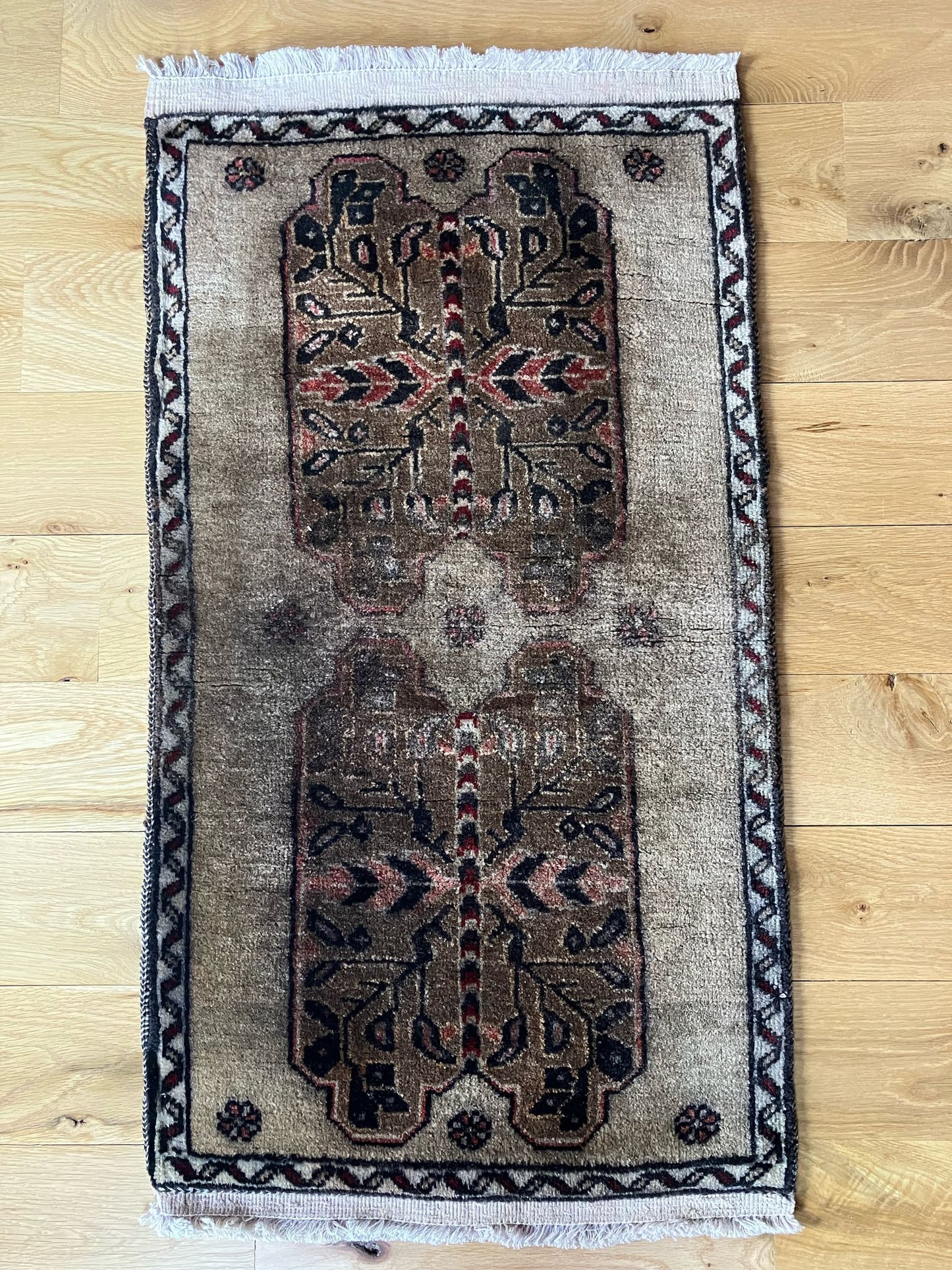 Handmade vintage Turkish entryway rug made of a cotton foundation and a wool pile, featuring gray and black colors.