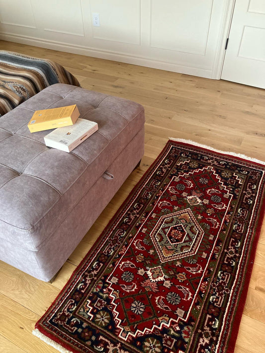 Handmade vintage Turkish smallrug made of 100% wool, featuring red and dark blue colors.   