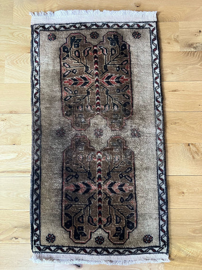 Handmade vintage Turkish entryway rug made of a cotton foundation and a wool pile, featuring  gray and black colors.