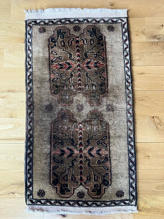 Handmade vintage Turkish entryway rug made of a cotton foundation and a wool pile, featuring  gray and black colors.