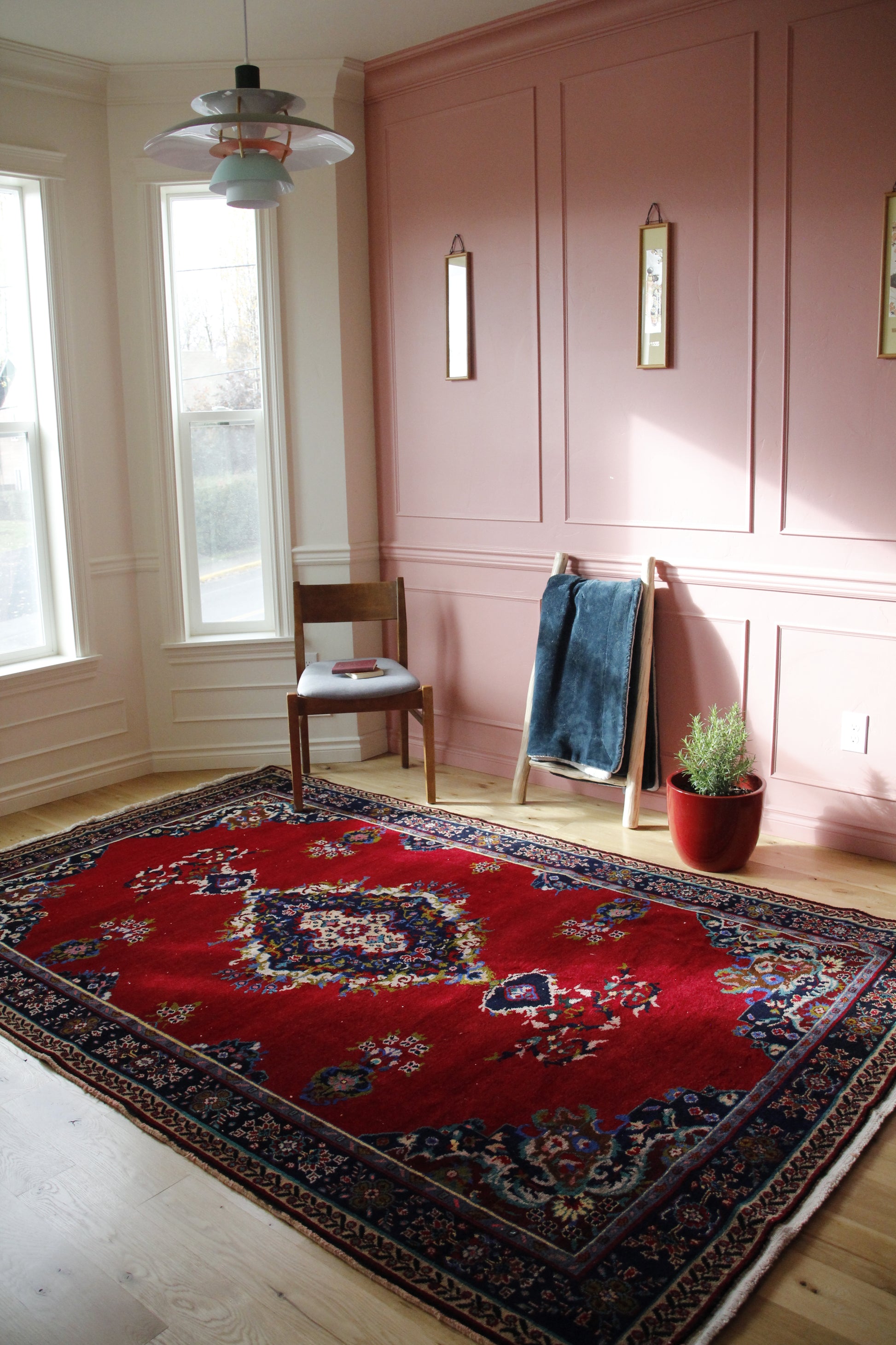 Handmade vintage Turkish large rug made of a cotton foundation and a wool pile, featuring  red and deep blue colors.