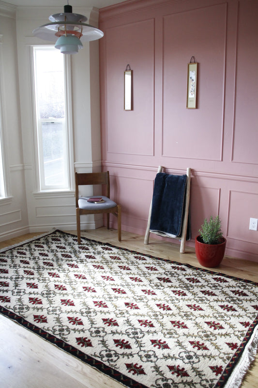 Handmade vintage Turkish large rug made of a cotton foundation and a wool pile, featuring  red and black colors.