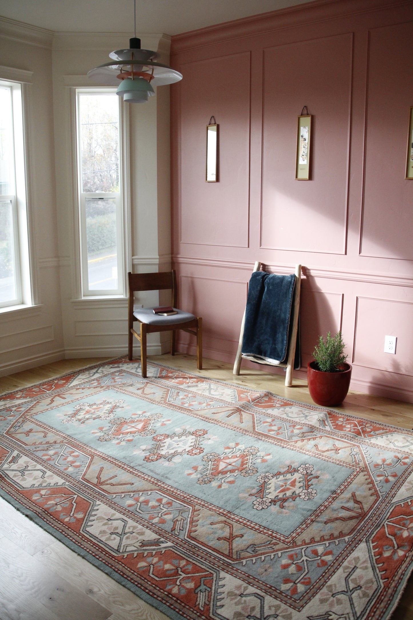 Handmade vintage Turkish large rug made of 100% wool, featuring blue and beige colors.    
