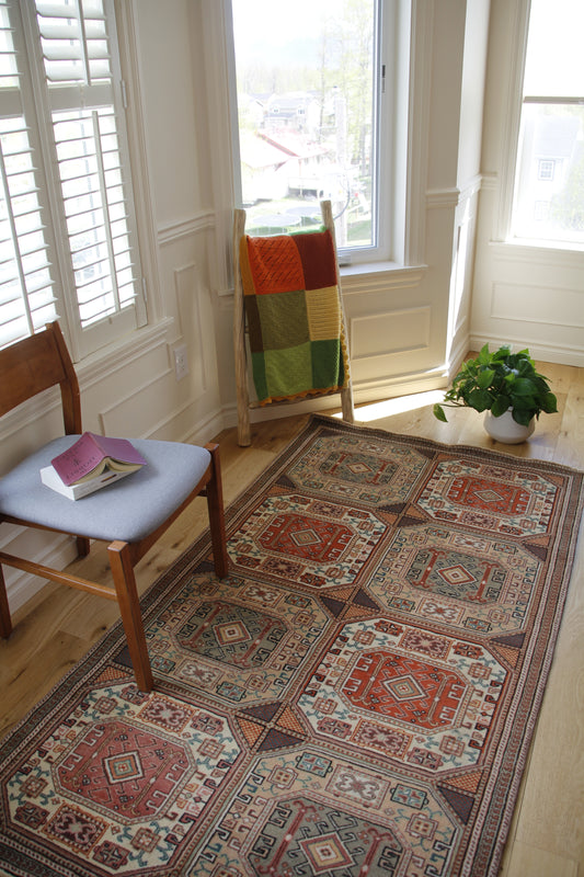 Handmade vintage Turkish medium rug made of a cotton foundation and a wool pile, featuring  brown and beige colors.