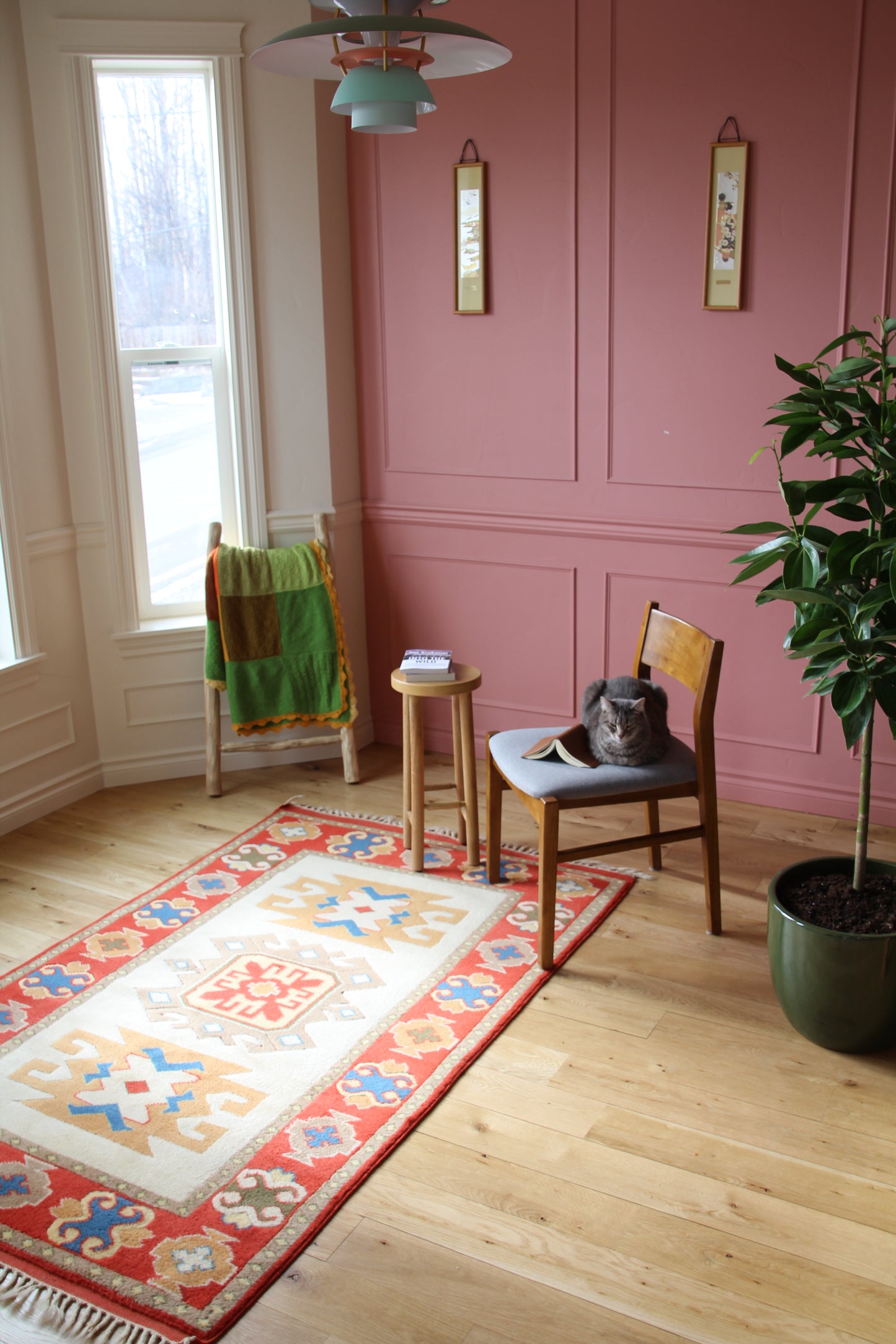 Handmade vintage Turkish medium rug made of 100% wool, featuring red, blue, and beige colors.    