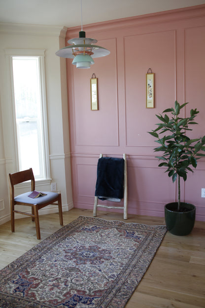 Handmade vintage Turkish medium rug made of a cotton foundation and a wool pile.