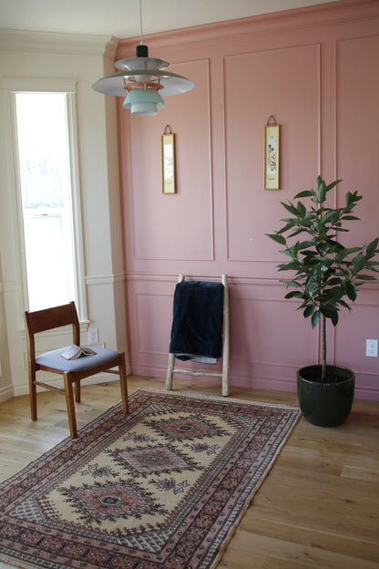 Handmade vintage Turkish medium rug made of a cotton foundation and a wool pile.