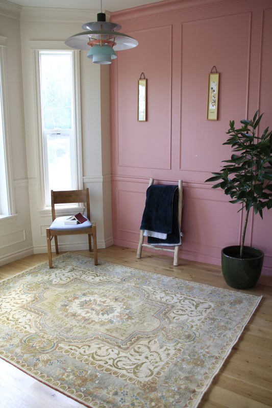 Handmade vintage Turkish medium rug made of 100% wool, featuring beige color.