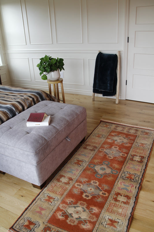 Handmade vintage Turkish runner made of 100% wool, featuring red, blue, and beige colors.    