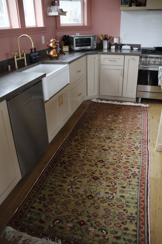 Handmade vintage Turkish runner made of a cotton foundation and a wool pile.