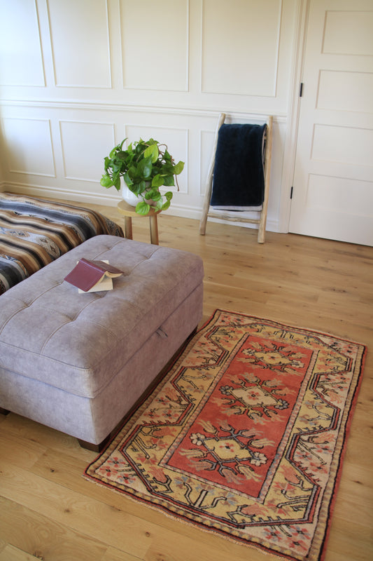 Handmade vintage Turkish small rug made of 100% wool.